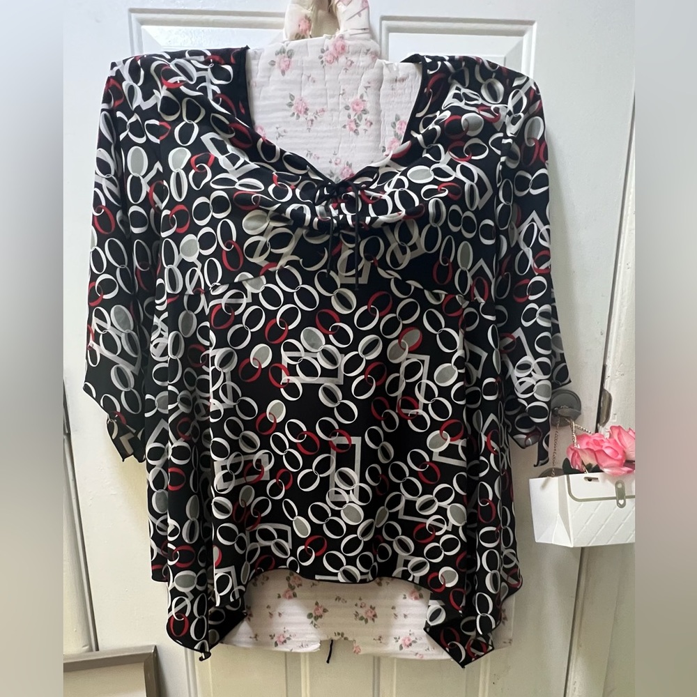 Ladies plus  fashion bug 30/32W asymmetrical print blouse